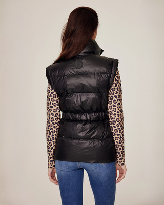 Detailed back view of the black equestrian vest showcasing the Riders Denim logo and the defined waistline.
