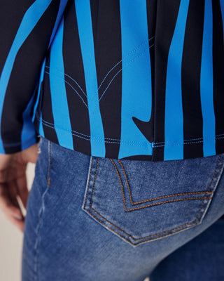 Detailed back view of the blue zebra riding top, highlighting the flattering compression fit and high-quality stitching.